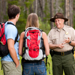 2 students with a game reserve guide